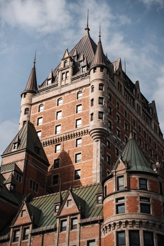 Majestic Château Frontenac in Québec City against a clear blue sky, showcasing historic architecture.