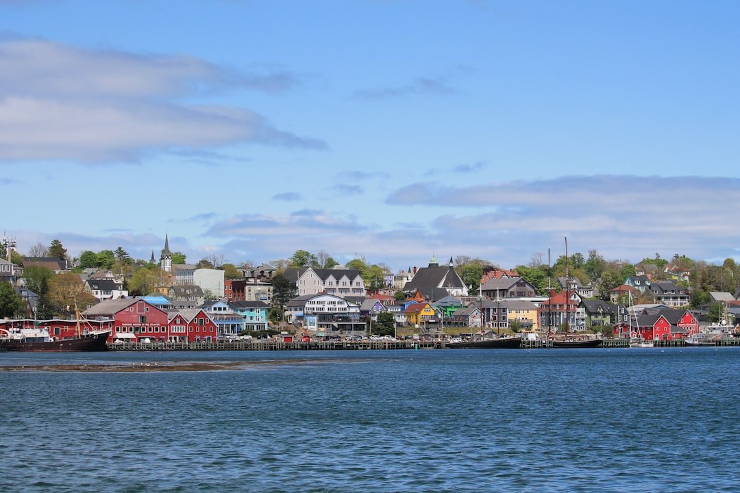 about-02 Lunenburg harbour and waterfront, with multicoloured heritage architecture and boats at port